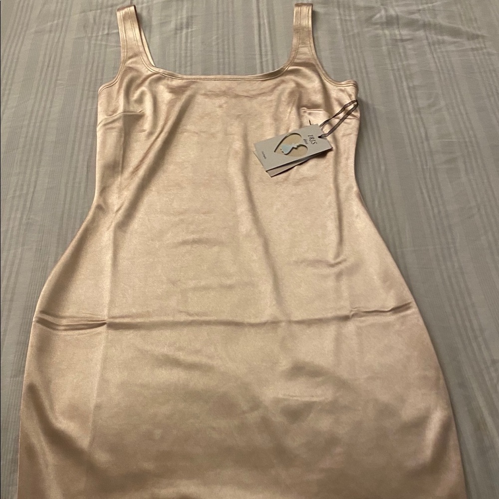 Brand new woman’s beautiful sexy fitted mid-dress